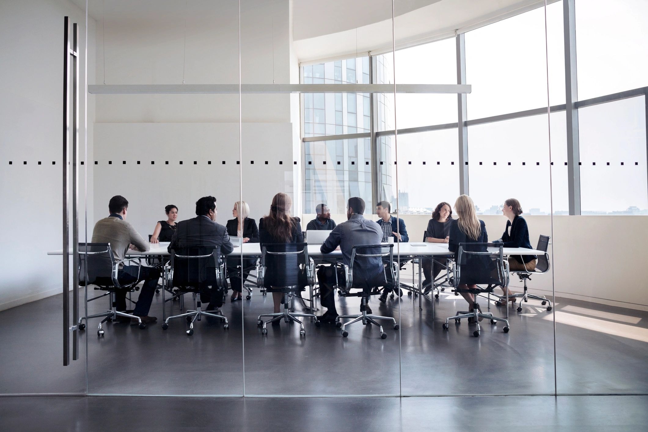 Business professionals collaborating around a conference table